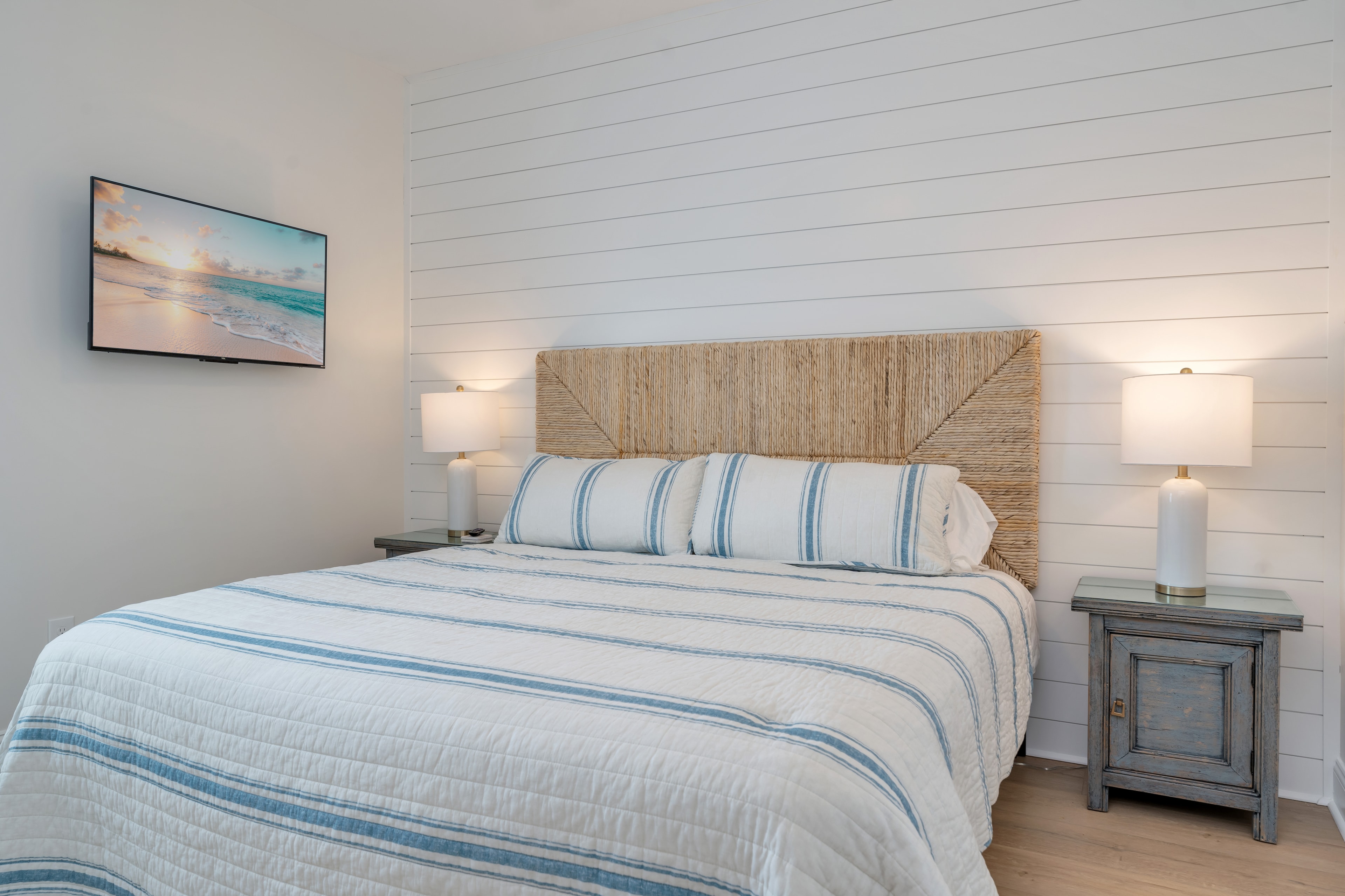Bedroom with shiplap wall