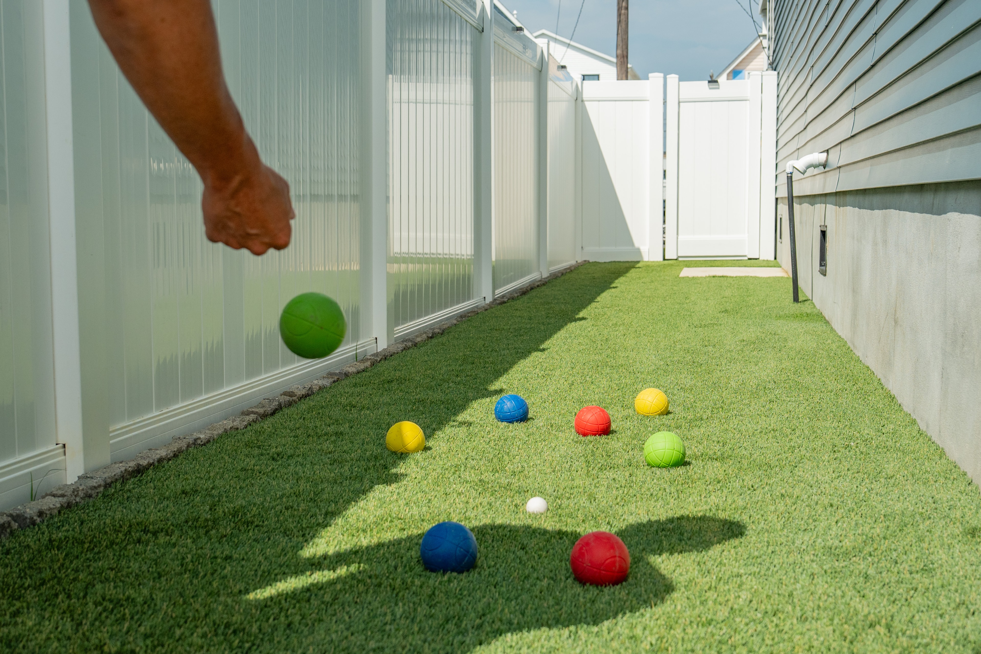 Bocce ball game on the turf lawn