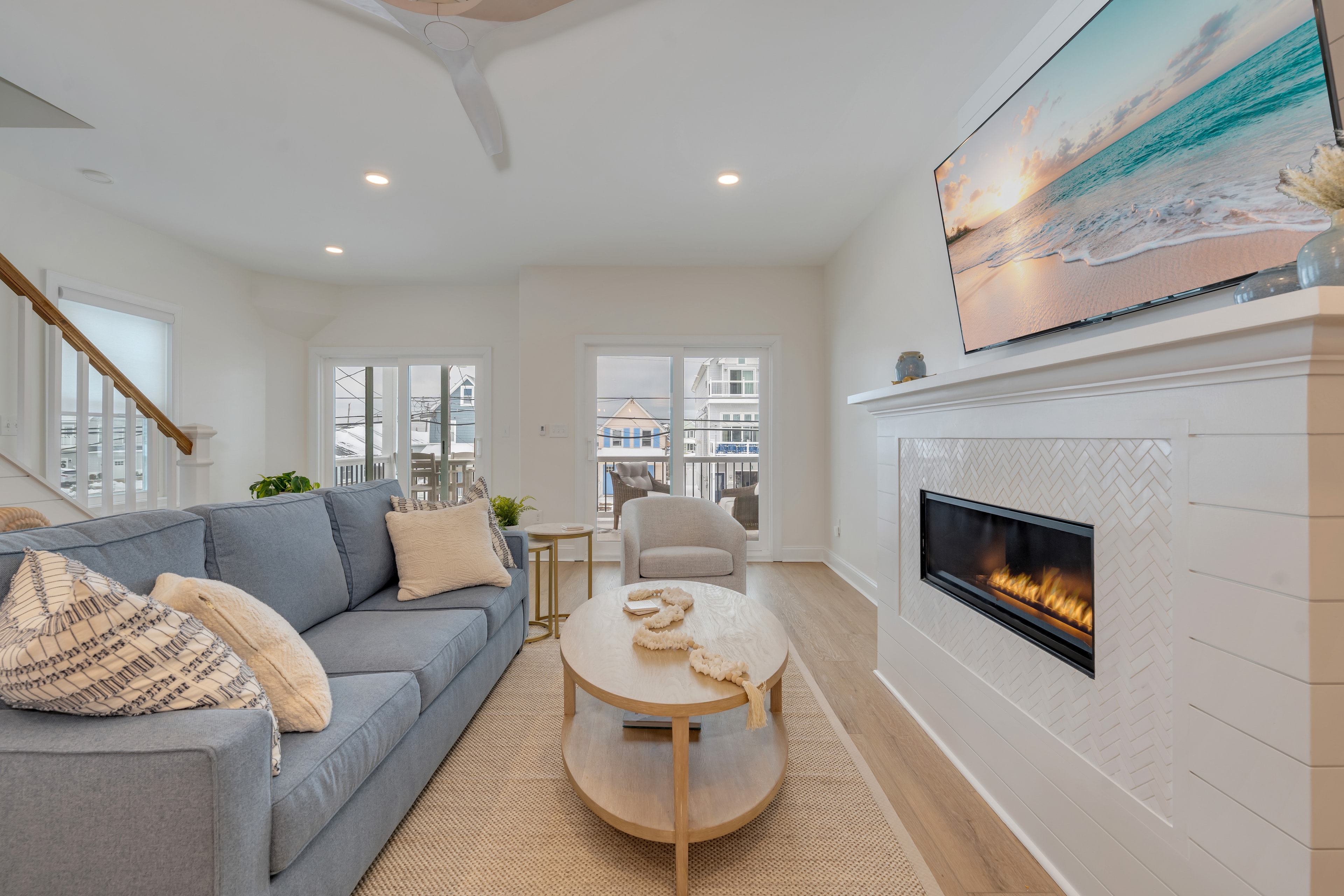 Living room with fireplace and blue sofa