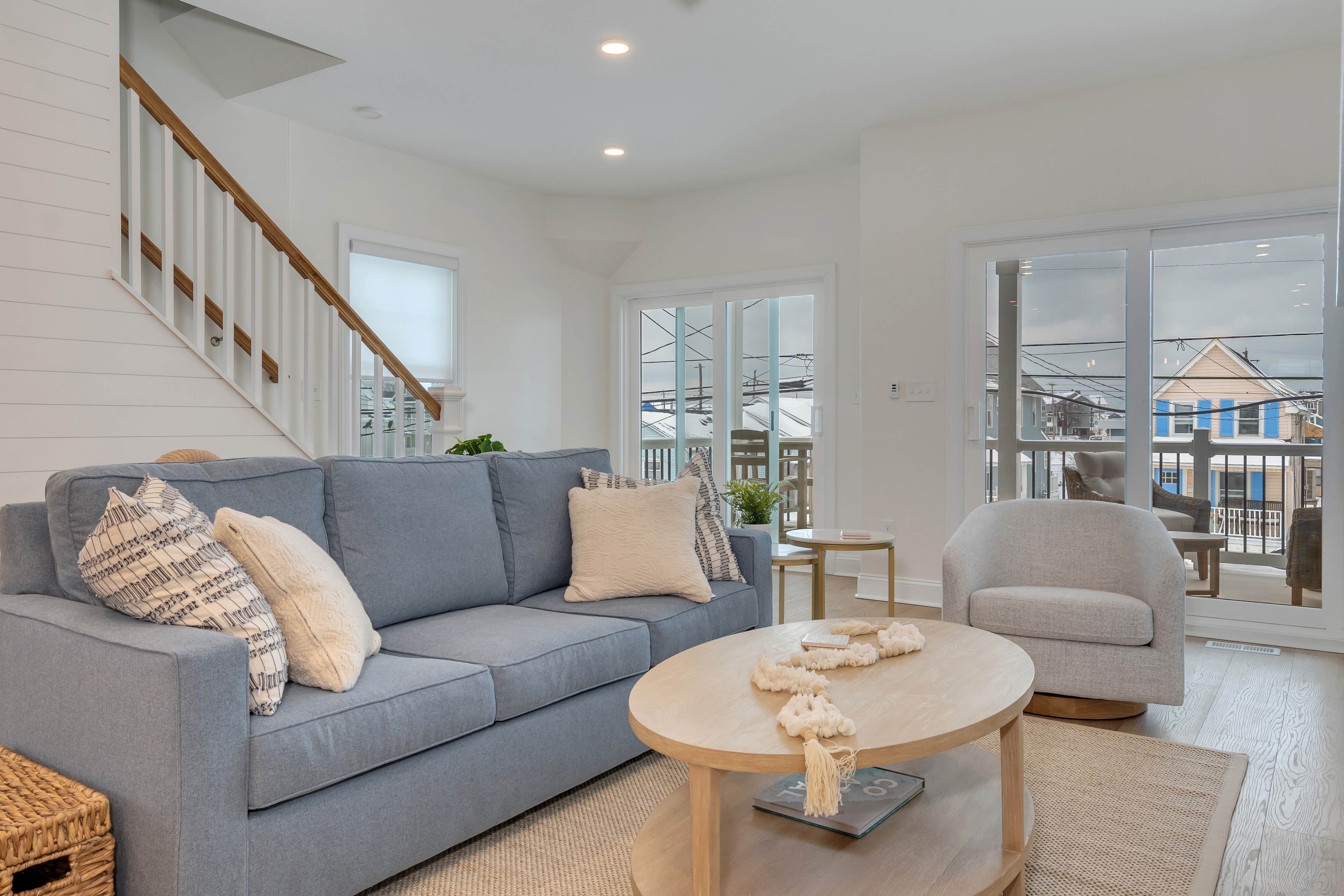 Living room alternate view with staircase
